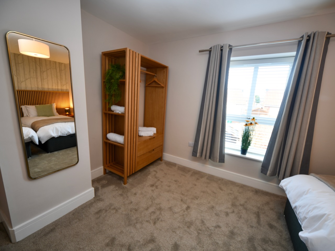 Full length mirror and wardrobe in bedroom 2