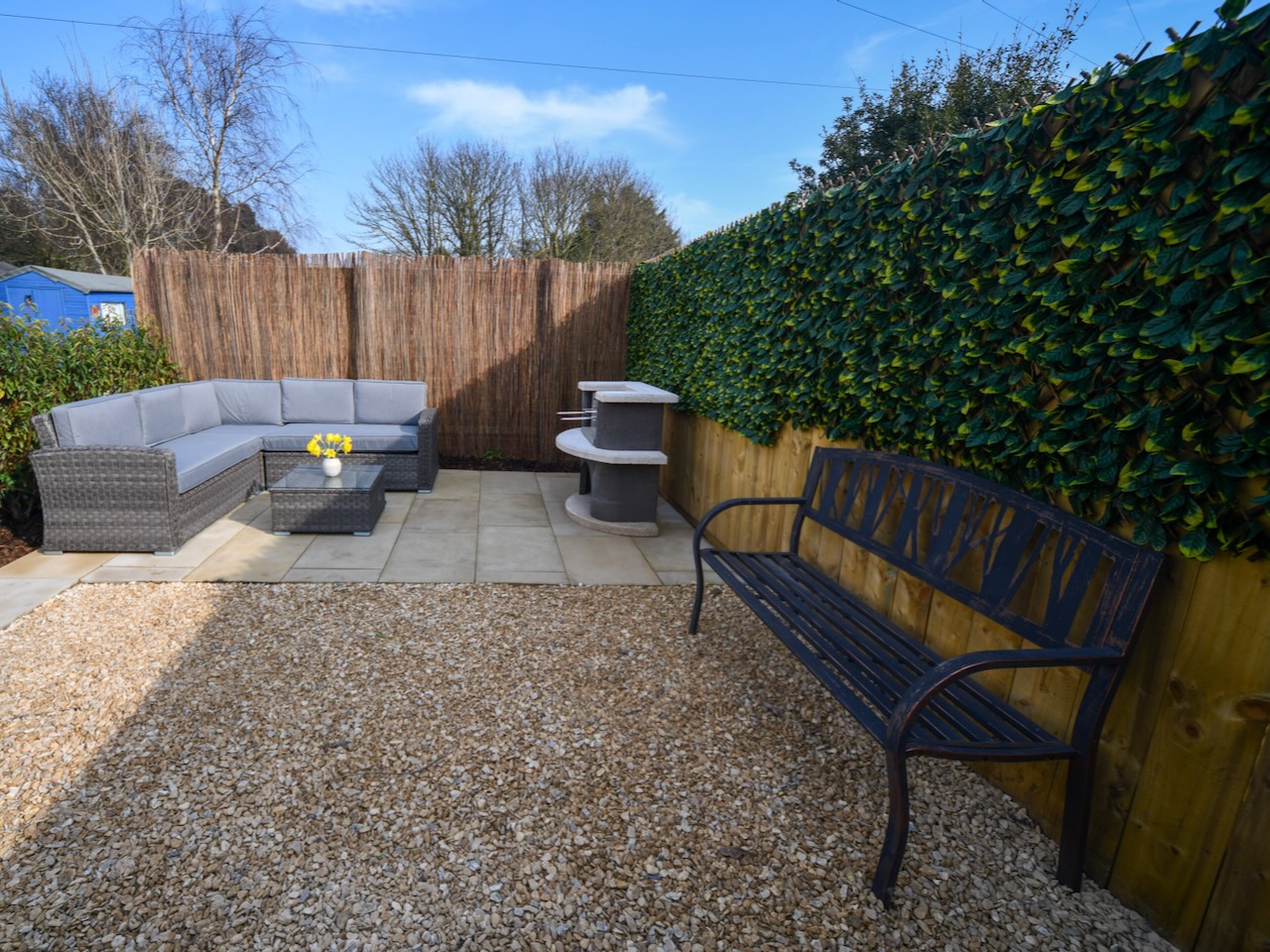 Enjoy time in the garden there's plenty places to sit